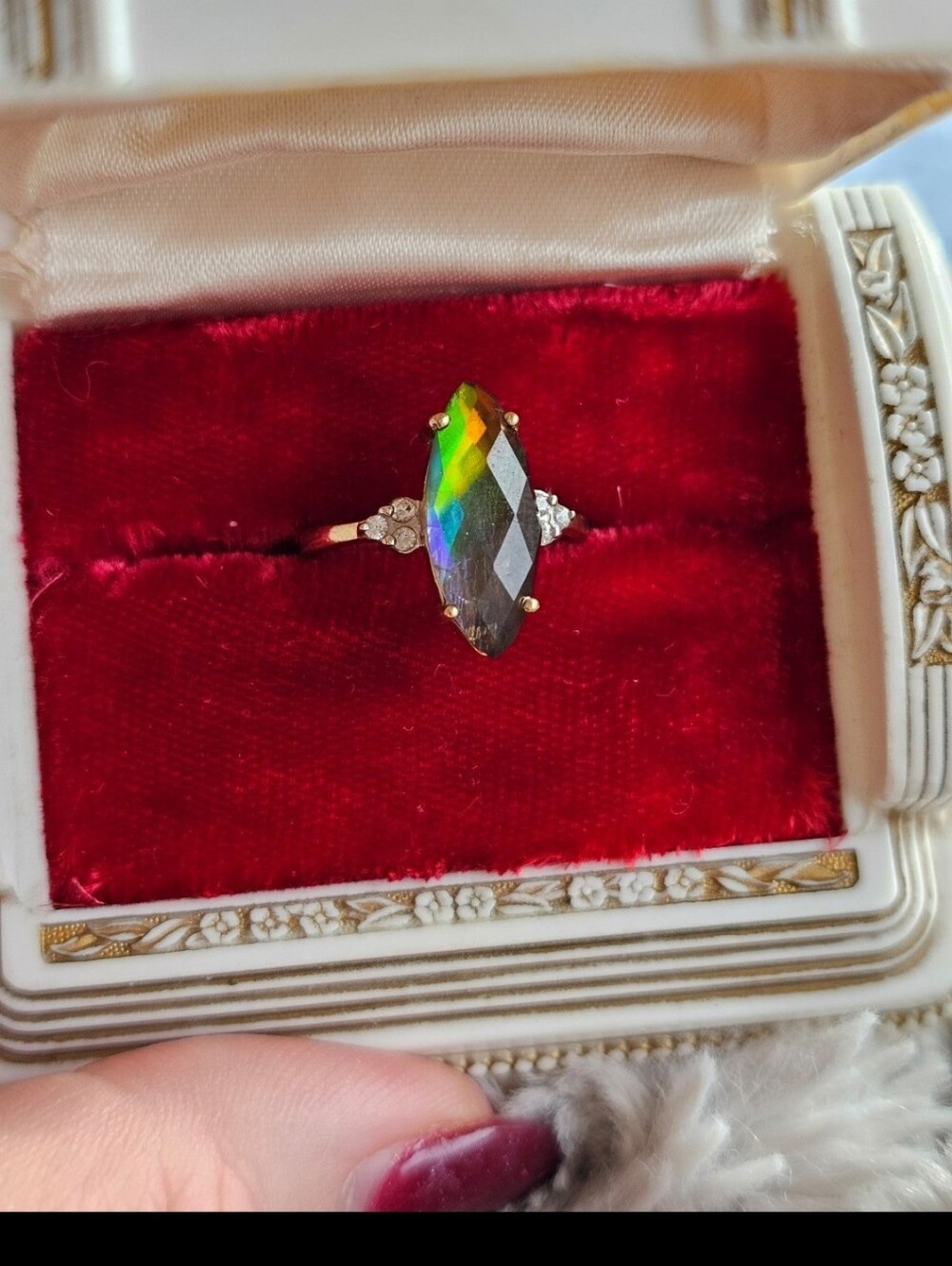 RARE!! 10k ammolite ring size 7 1/4. Stamped 10k. Genuine ammolite with what app